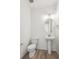 Clean powder room with pedestal sink and modern fixtures at 811 Goodrich Peak St, Erie, CO 80516