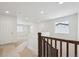 Upstairs hallway with access to bedrooms and bathroom at 811 Goodrich Peak St, Erie, CO 80516