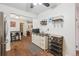 Dining area with custom storage, serving area, wine rack, and adjacent breakfast nook in a cozy, welcoming space at 1774 S Dover Way, Lakewood, CO 80232