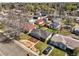 Charming single-Gathering home featuring a well-maintained lawn, mature trees, and a private driveway at 4374 S Washington St, Englewood, CO 80113