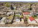 Features a single-Gathering home with a detached garage, fenced-in yard, and tree-lined streets in a Gathering-friendly neighborhood at 4374 S Washington St, Englewood, CO 80113