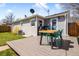 Backyard with deck and patio set, along with a gas grill at 4374 S Washington St, Englewood, CO 80113