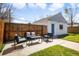 Private patio with lounge set and outdoor string lights at 4374 S Washington St, Englewood, CO 80113