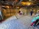 Unfinished basement space with visible ceiling beams, block foundation, and concrete floor at 4374 S Washington St, Englewood, CO 80113