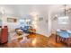 Inviting living room with hardwood floors, lots of light, and comfortable seating at 4374 S Washington St, Englewood, CO 80113