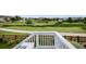 View of a backyard with grass and a walking trail at 10387 Harrisburg St, Parker, CO 80134