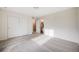 Bedroom with neutral colored carpet and a sliding door closet at 10387 Harrisburg St, Parker, CO 80134