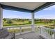 Enjoy this deck view with a seating area and landscape views of the neighborhood at 10387 Harrisburg St, Parker, CO 80134