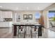 Elegant dining room with a modern table and chairs, offering a welcoming space for meals at 10387 Harrisburg St, Parker, CO 80134