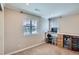 Sunlit room with desk, storage, and a bright window overlooking the neighborhood at 23503 E Minnow Dr, Aurora, CO 80016
