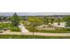 Beautiful community park featuring lush green spaces, walking paths, and recreation areas at 23503 E Minnow Dr, Aurora, CO 80016