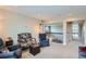 Comfortable living room features cozy seating, neutral tones, and second-story view at 23503 E Minnow Dr, Aurora, CO 80016
