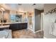 Beautiful main bathroom with double vanities, quartz counters, and glass shower at 23503 E Minnow Dr, Aurora, CO 80016
