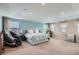 Large main bedroom featuring a king bed, tray ceiling, and ample natural light at 23503 E Minnow Dr, Aurora, CO 80016