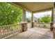 Inviting porch with stone pillars and landscaping provides a welcoming exterior feature at 23503 E Minnow Dr, Aurora, CO 80016