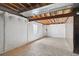 Unfinished basement with exposed ceiling and insulated walls offers potential for customization at 1272 Braewood Ave, Highlands Ranch, CO 80129