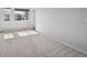 Bright bedroom with neutral carpet and lots of natural light at 1272 Braewood Ave, Highlands Ranch, CO 80129