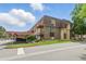 Apartment building featuring covered parking and lush landscaping, offering both convenience and curb appeal at 7755 E Quincy Ave # 107D2, Denver, CO 80237