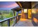 Balcony with mountain views and a built-in fireplace at 52 West Point Lode # A, Breckenridge, CO 80424