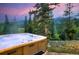 Hot tub on patio with mountain views at sunset at 52 West Point Lode # A, Breckenridge, CO 80424