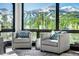 Living room with mountain views and comfy armchairs at 52 West Point Lode # A, Breckenridge, CO 80424