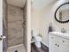 Basement bathroom with walk-in shower and vanity at 3338 S Canosa Ct, Englewood, CO 80110