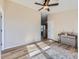 Bright bedroom with ceiling fan and wood-look floors at 3338 S Canosa Ct, Englewood, CO 80110