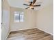 Bright bedroom with ceiling fan and window at 3338 S Canosa Ct, Englewood, CO 80110