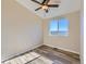 Bright bedroom with ceiling fan and window offering a view at 3338 S Canosa Ct, Englewood, CO 80110