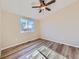 Spacious bedroom with ceiling fan and large window at 3338 S Canosa Ct, Englewood, CO 80110