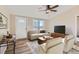 Living room with light walls and comfy seating at 3338 S Canosa Ct, Englewood, CO 80110