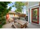 Backyard patio with seating, a dining table, and a grill at 1265 S Sherman St, Denver, CO 80210