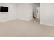 Spacious bonus room with neutral carpet, great natural light, and a built-in mount for a TV at 1265 S Sherman St, Denver, CO 80210