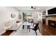 Inviting living room with a cozy sofa, stone fireplace, and easy access to the outdoor patio at 1265 S Sherman St, Denver, CO 80210