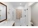 Beautiful bathroom featuring a glass shower with white tile and stylish fixtures, creating a spa-like experience at 1265 S Sherman St, Denver, CO 80210