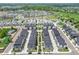 A new townhouse community features modern architecture, landscaping, sidewalks, and convenient parking at 5387 Pierson Ct, Wheat Ridge, CO 80033
