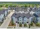A high-angle shot showcases modern townhomes with contemporary design and landscaping at 5387 Pierson Ct, Wheat Ridge, CO 80033