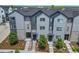 Aerial view showcasing modern townhomes with well-maintained yards and contemporary design at 5387 Pierson Ct, Wheat Ridge, CO 80033