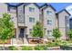 Attractive townhome exteriors with well-manicured landscaping, providing a welcoming curb appeal at 5387 Pierson Ct, Wheat Ridge, CO 80033