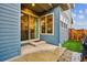 Home featuring a covered patio with sliding glass doors that provides seamless indoor/outdoor living at 10360 E 57Th Pl, Denver, CO 80238