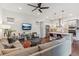 Open concept floor plan features a modern kitchen, living and dining area at 10360 E 57Th Pl, Denver, CO 80238