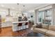 Open concept floor plan features a modern kitchen, living and dining area at 10360 E 57Th Pl, Denver, CO 80238