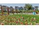 Community park featuring landscaped green space, flowers and shade, and seating at 10360 E 57Th Pl, Denver, CO 80238