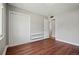 Bedroom with wood floors, closet, and natural light, offering a cozy and functional space at 2751 S Elm St, Denver, CO 80222
