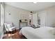 Bright bedroom with modern decor, hardwood floors, closet and comfortable furnishings at 2751 S Elm St, Denver, CO 80222