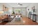 This living room features modern decor, wood floors, and a large window for natural light at 2751 S Elm St, Denver, CO 80222