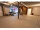 Spacious unfinished basement with exposed ceiling offers potential for future expansion at 1056 S Elk Way, Aurora, CO 80018