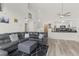 Living room and kitchen with modern decor, comfortable seating, and high ceilings at 2569 Devonshire Ct # 72, Denver, CO 80229