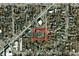 Aerial view of a neighborhood featuring the property at 959 S Wolff St, outlined in red, nestled among residential streets at 971 S Wolff St, Denver, CO 80219