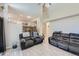 Open-concept living room with views to the kitchen and second-floor, showcasing modern decor at 13212 Clermont Cir, Thornton, CO 80241